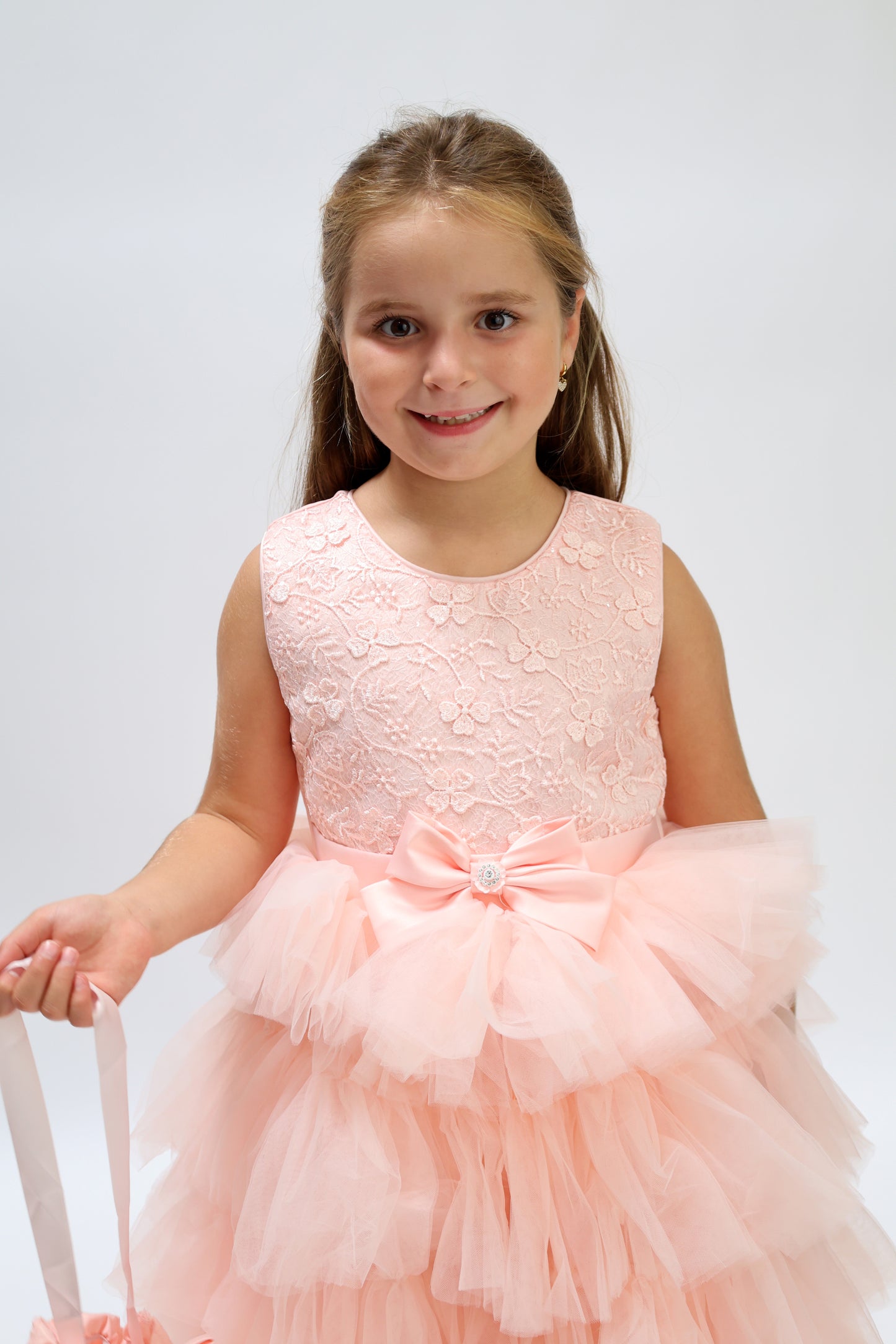 Robe de cérémonie rose à volants et gros nœud