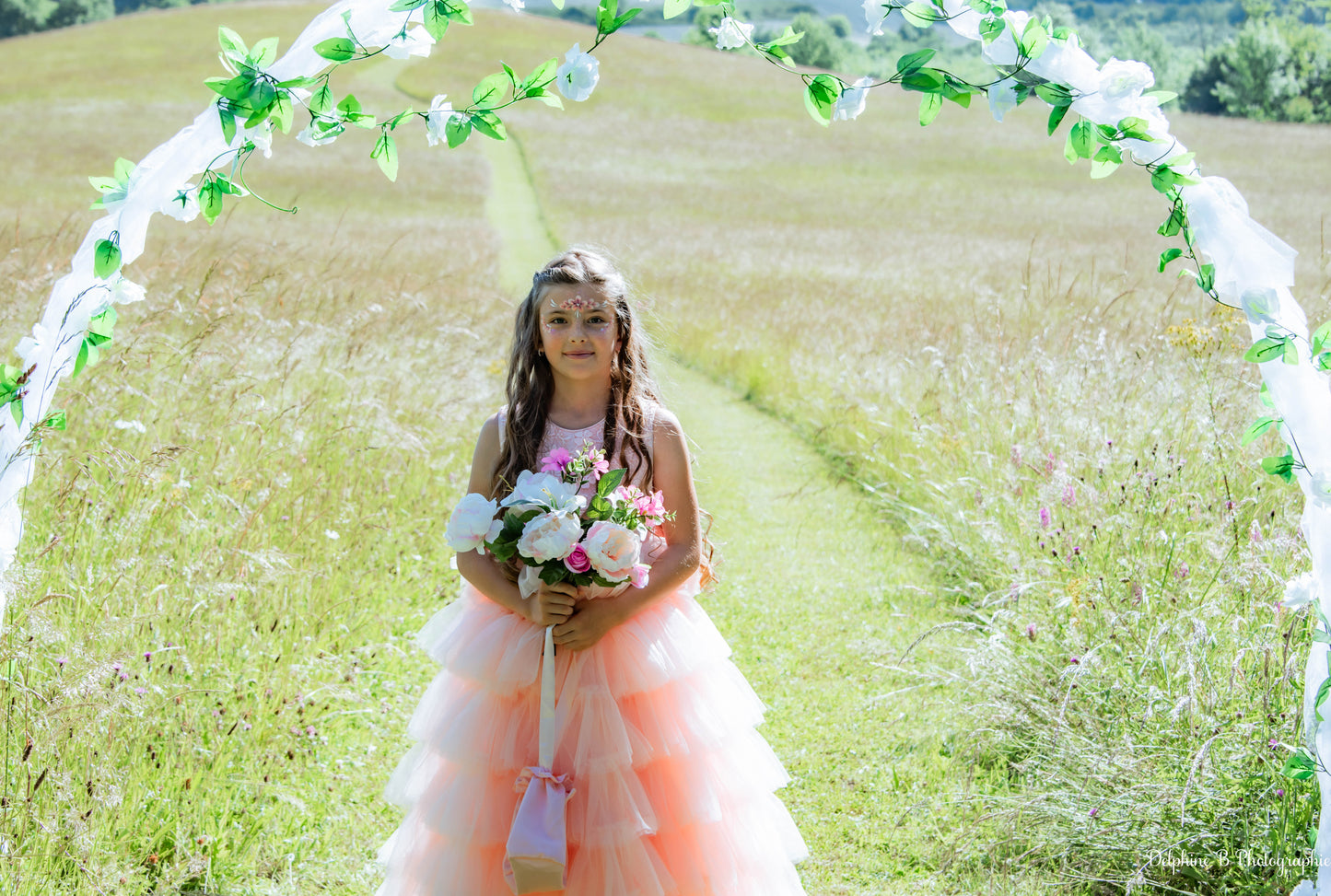 Robe de cérémonie rose à volants et gros nœud