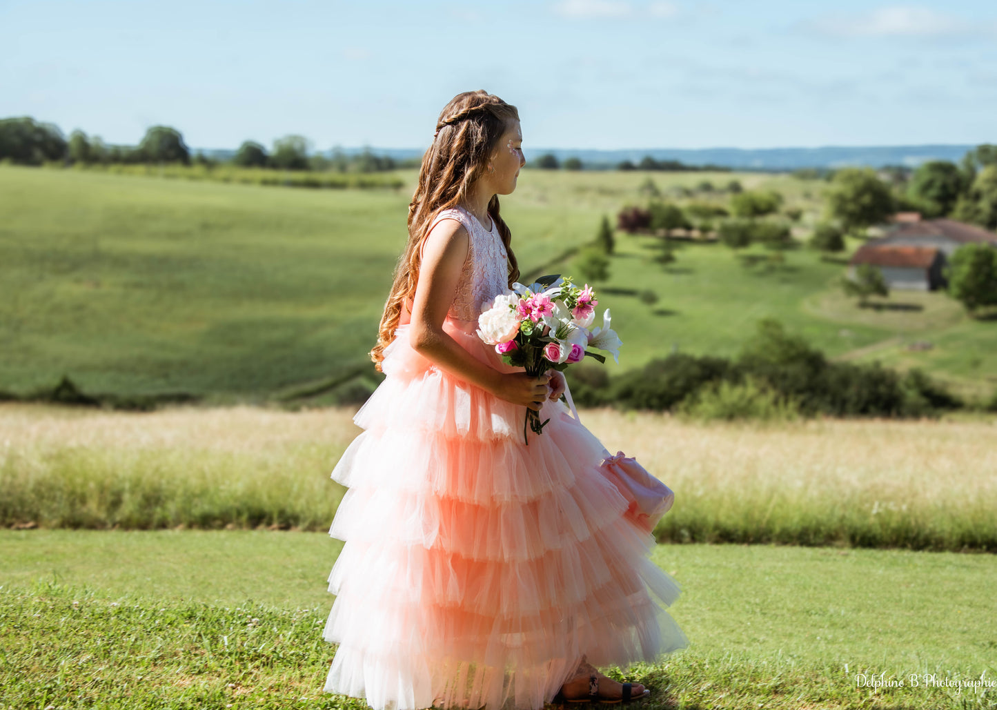 Robe de cérémonie rose à volants et gros nœud