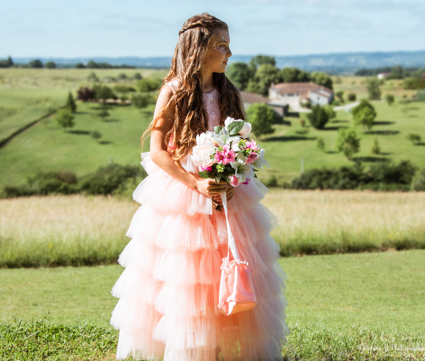 Robe de cérémonie rose à volants et gros nœud