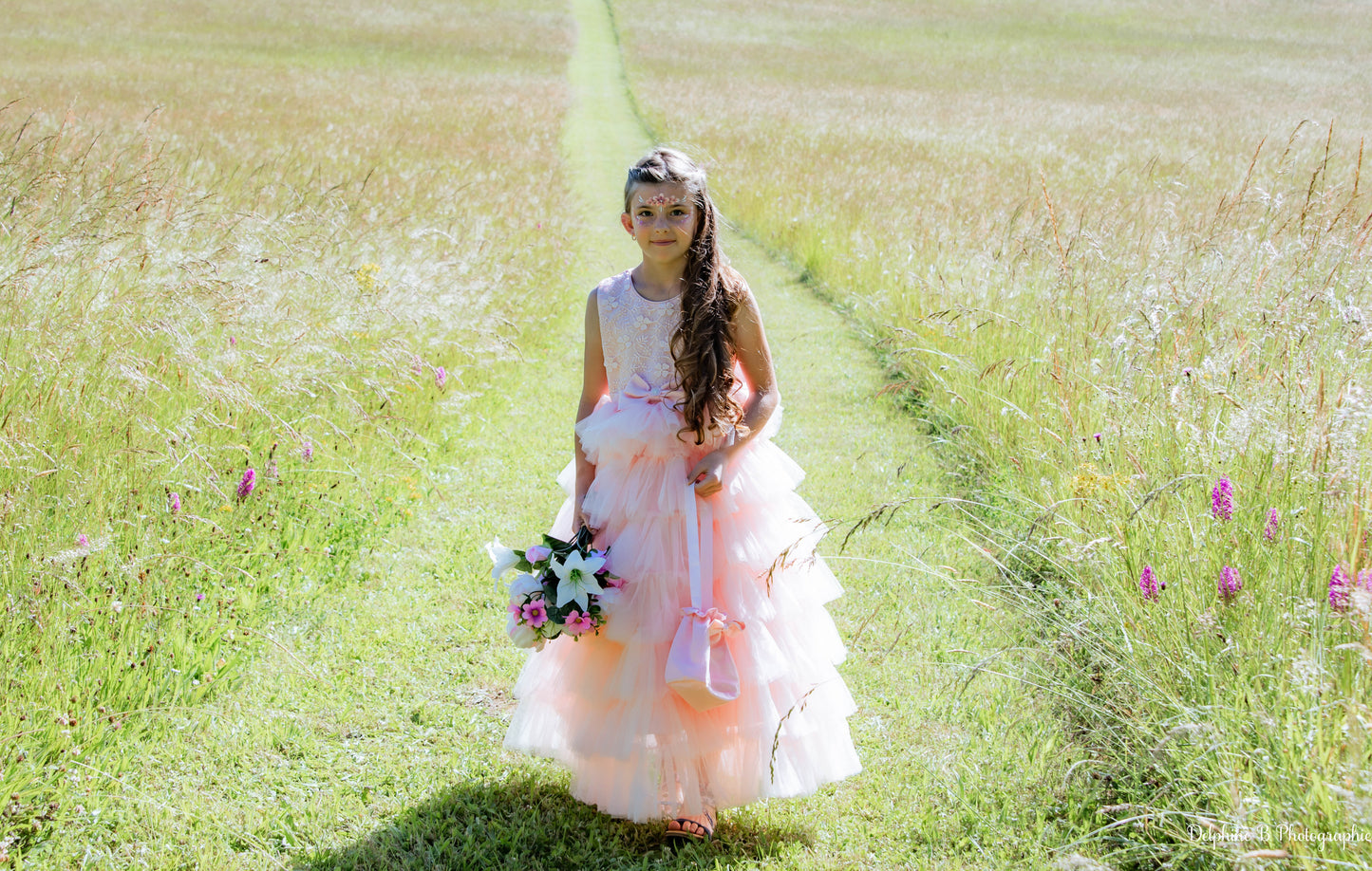 Robe de cérémonie rose à volants et gros nœud