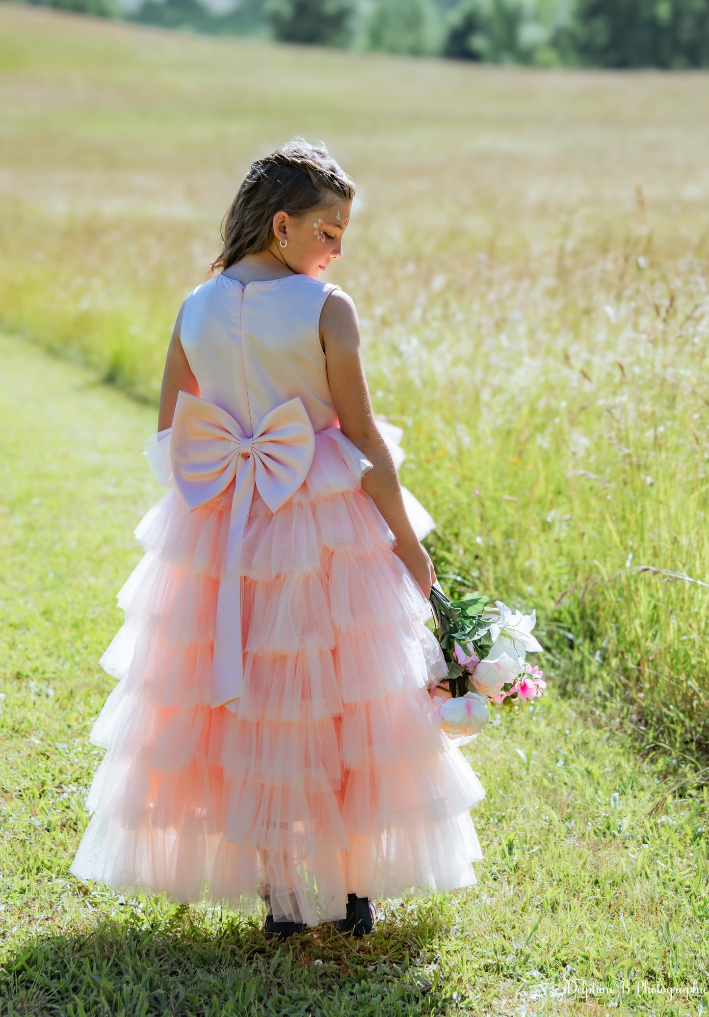 Robe de cérémonie rose à volants et gros nœud