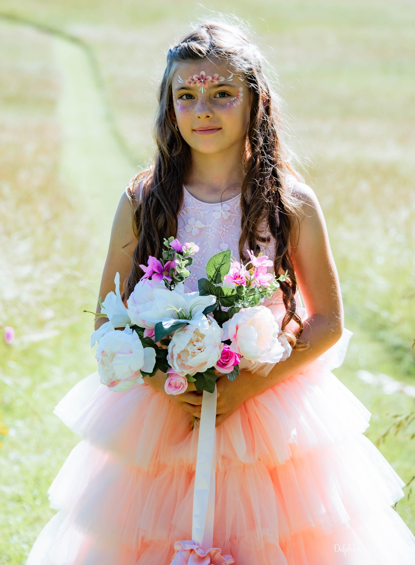 Robe de cérémonie rose à volants et gros nœud