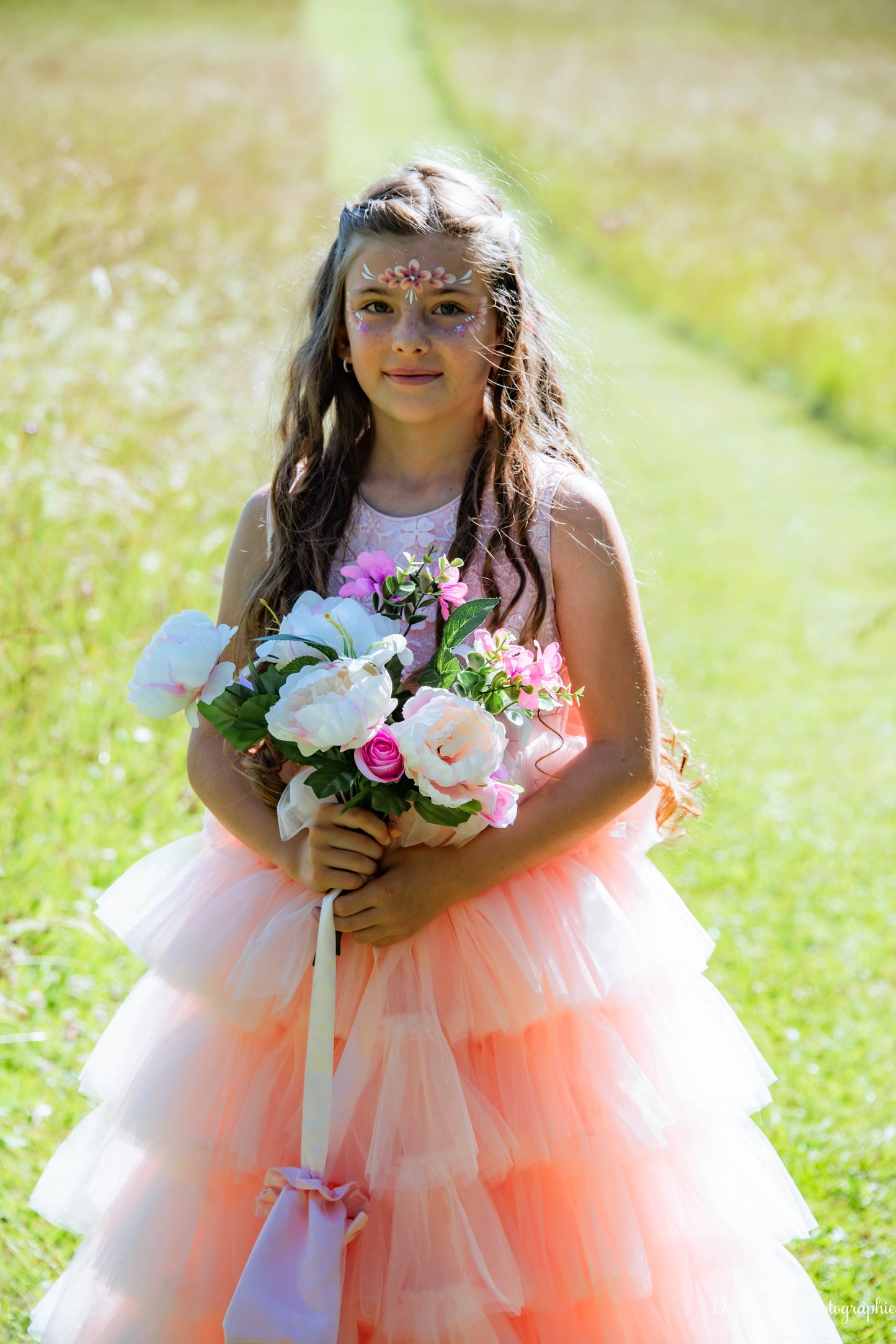 Robe de cérémonie rose à volants et gros nœud