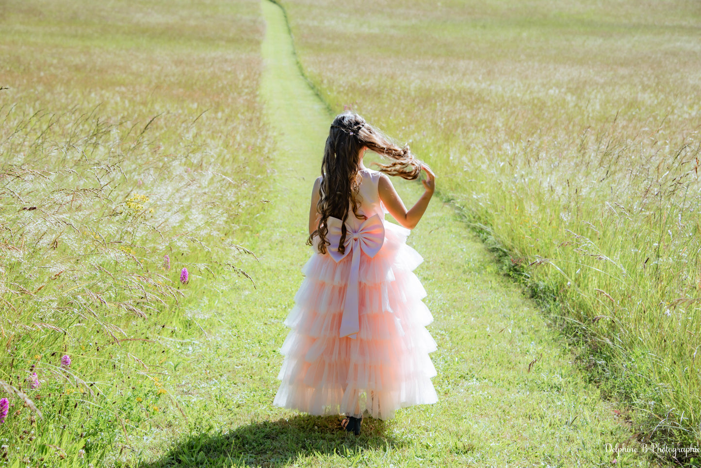 Robe de cérémonie rose à volants et gros nœud