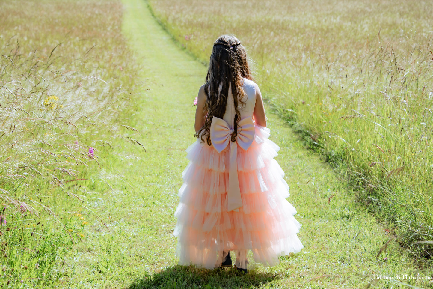 Robe de cérémonie rose à volants et gros nœud