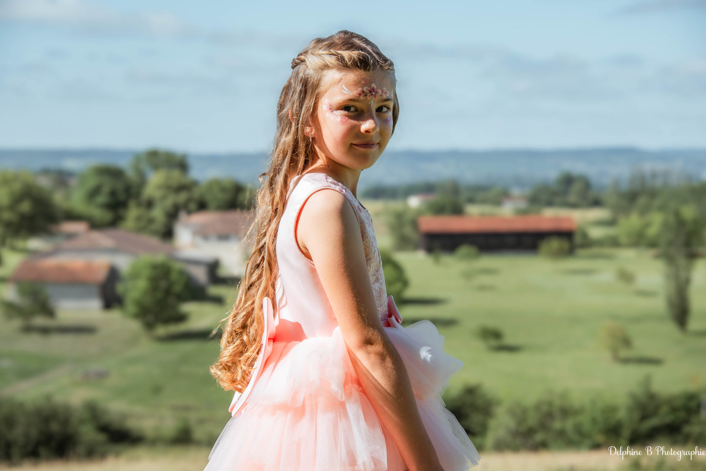 Robe de cérémonie rose à volants et gros nœud