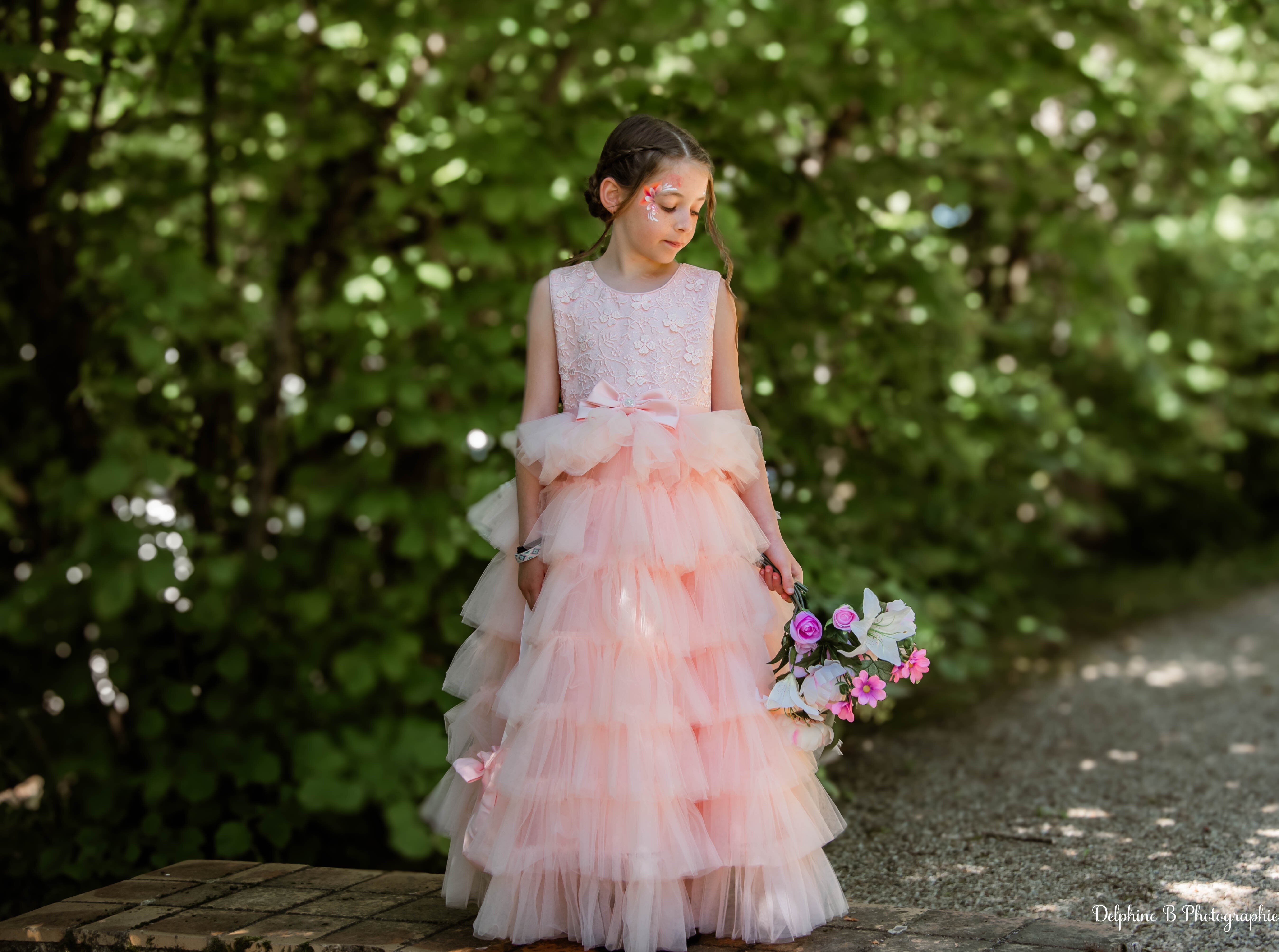 Robe de cérémonie rose à volants et gros nœud